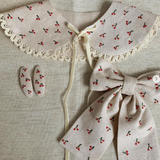 Boucle cheveux beige avec cerises